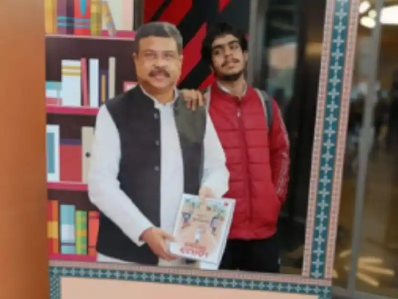 Saksham Gupta with his book