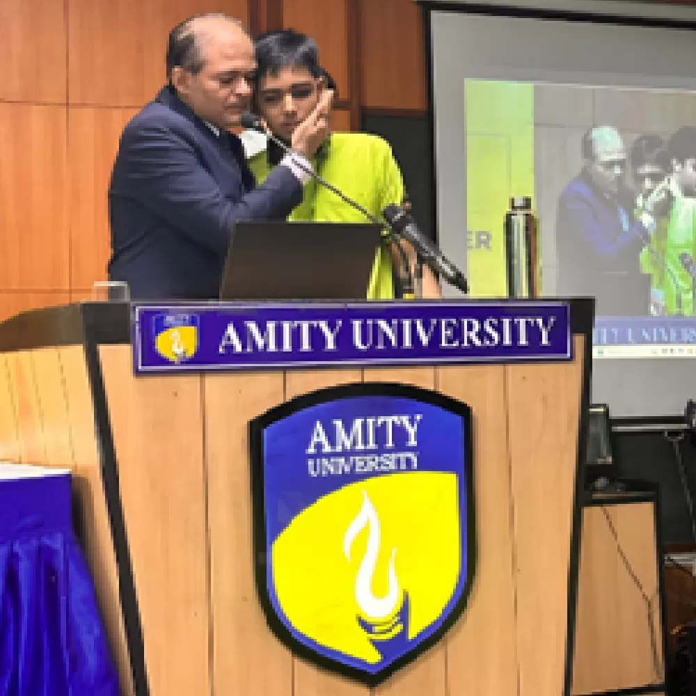 Ojas delivering speech at Amity University for their RCI Training Inauguration Ceremony